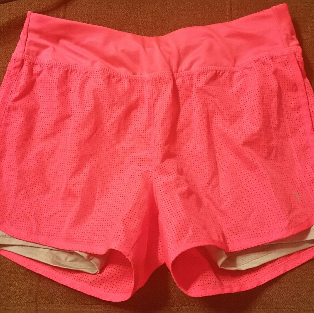 Bright pink workout shorts